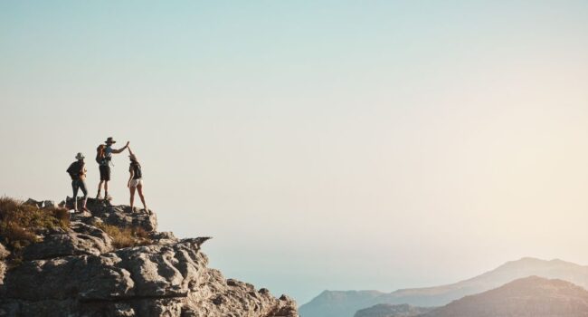 people on top of mountain